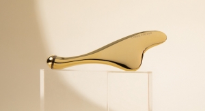 Luxe Skincare Tool Launches—a Solar-Powered, 24K Gold-Plated Facial Gua Sha